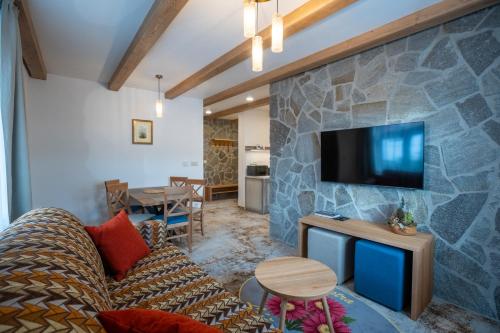 TV a/nebo společenská místnost v ubytování Apartmány Lúčny Raj