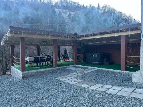 Photo de la galerie de l'établissement Cabana Bianca & Iair, à Poiana Vadului