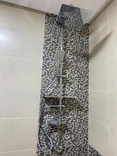 Et badeværelse på Apartment in Bouznika with pool