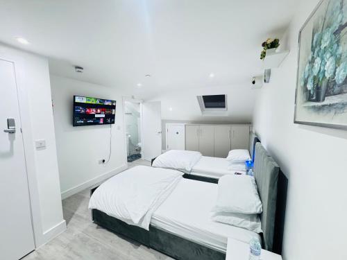 Postel nebo postele na pokoji v ubytování Letza House - Private En-Suite Rooms near Cardiff City Centre