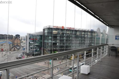 a view of a city from a balcony of a building at Viru Väljak Homes in Tallinn