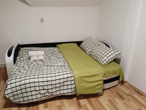 Postel nebo postele na pokoji v ubytování Gara mare living-dormitor