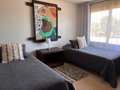 Ένα ή περισσότερα κρεβάτια σε δωμάτιο στο Hostal Boutique 180 Grados