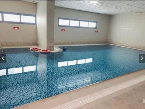 Piscina de la sau aproape de One bedroom with tow bed