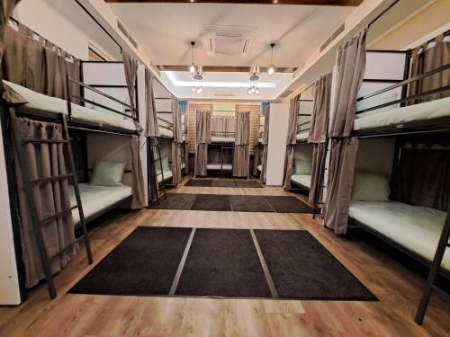 Postel nebo postele na pokoji v ubytování TURQUOISE Hostel