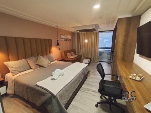 En eller flere senge i et værelse på Epic Suite 210 Deluxe Aeropuerto