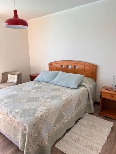 En eller flere senge i et værelse på Papudo laguna