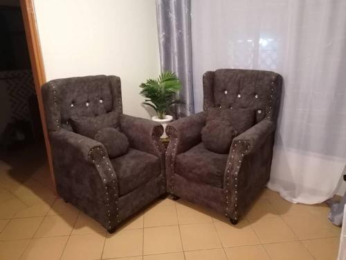 Χώρος καθιστικού στο Maya's 2bedroom Tawan