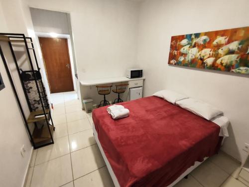 En eller flere senge i et værelse på Loft Comfort 208 Ar Condicionado Centro Niterói