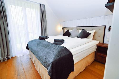 Giường trong phòng chung tại Die-Strandburg-Moewenweg