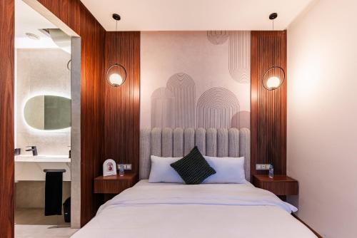 En eller flere senge i et værelse på Studio de luxe - CFC - Maarif