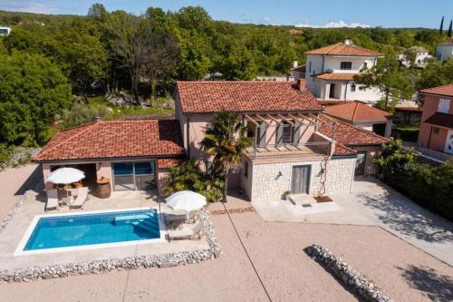 Family friendly house with a swimming pool Ljutici, Krk - 25039