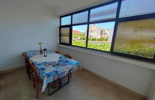 Apartments with parking space Barbat, Rab - 25045