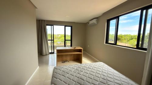 En eller flere senge i et værelse på Casa 49 Reserva Sauípe