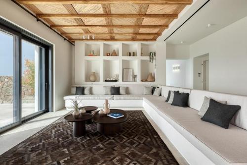 Et opholdsområde på Private Villa Houlakia Mikonos