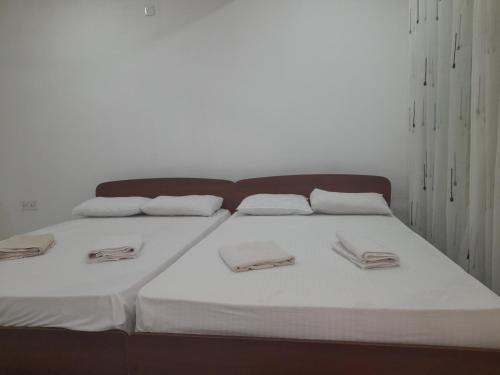 Postel nebo postele na pokoji v ubytování Hotel Ameliya