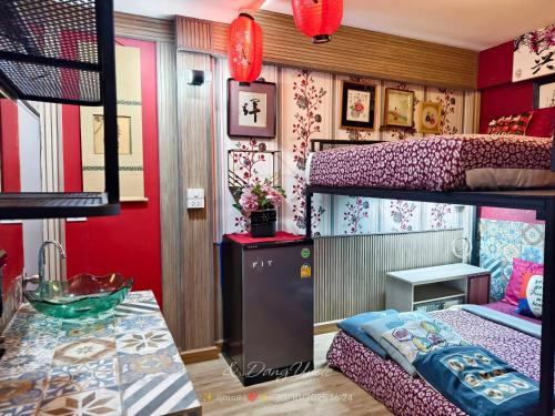 En eller flere senge i et værelse på โรงแรม เลิฟ บีเคเค