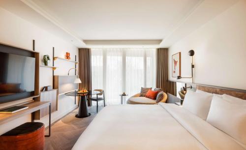 En eller flere senge i et værelse på Kennedy 89 Unbound Collection Hyatt