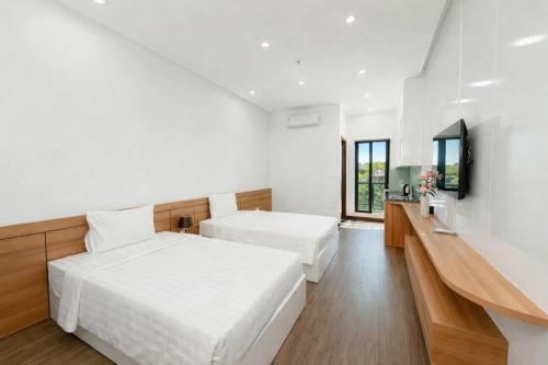 Postel nebo postele na pokoji v ubytování TD Apartment