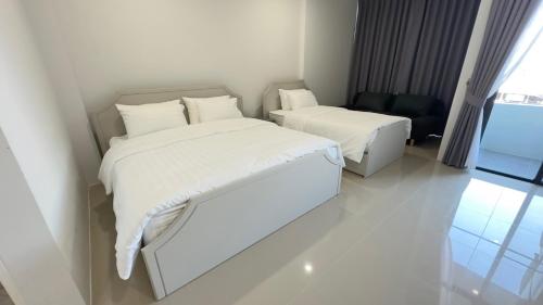 Postel nebo postele na pokoji v ubytování Airport Stay Phuket Zz