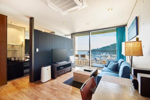 Et tv og/eller underholdning på Relax Resort Hotel