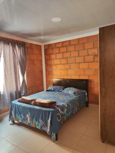 En eller flere senge i et værelse på CasaJuan