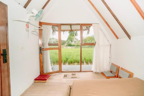 Ένα ή περισσότερα κρεβάτια σε δωμάτιο στο BAMBOO Shack & BAMBOO Cabin