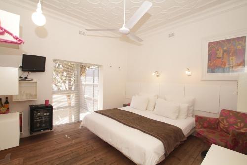 Ένα ή περισσότερα κρεβάτια σε δωμάτιο στο Motel Mi Pi Chi