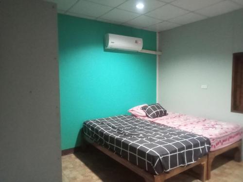 En eller flere senge i et værelse på hadya home