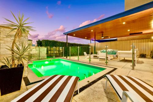 a swimming pool in the backyard of a house at Luxury Villa W Pool & Spa 5 BEDROOMS in Coogee