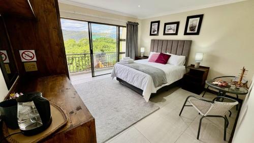 En eller flere senge i et værelse på On Appointment at the Sea