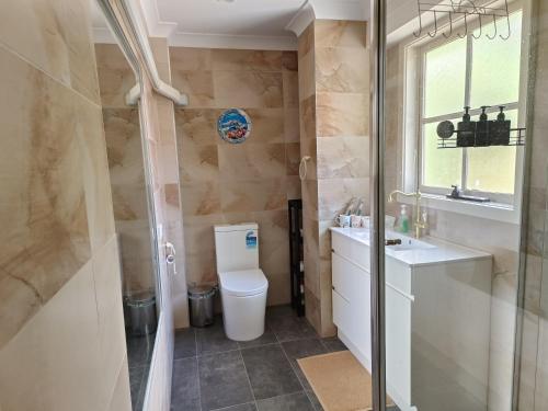 Phòng tắm tại Grandvista Cottage