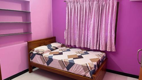 Giường trong phòng chung tại VMS Stay