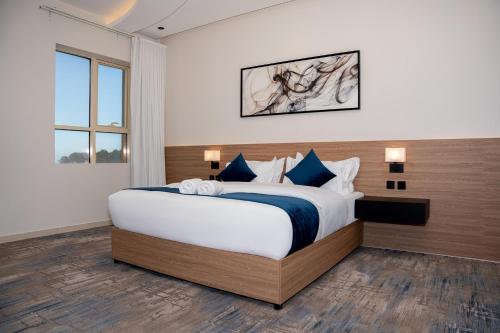 Postel nebo postele na pokoji v ubytování ارجان بارك الحمراء