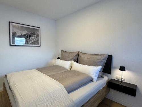 Postel nebo postele na pokoji v ubytování Lucy s Studio Apartment Kössen