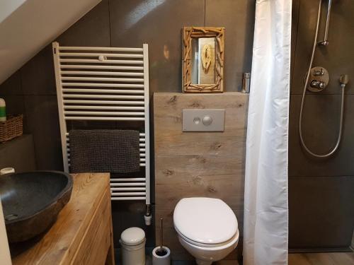 Et badeværelse på La Ferme de Spa