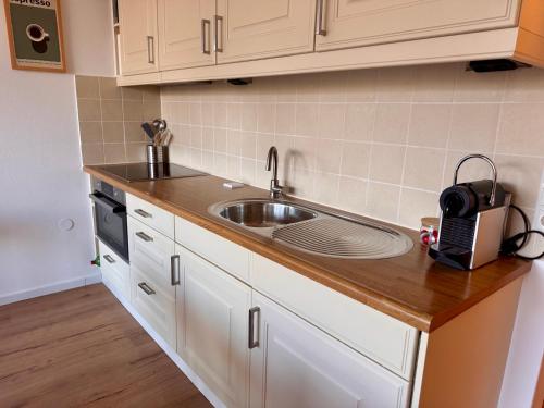 Køkken eller tekøkken på Bergzeit Apartments