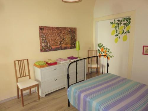 A bed or beds in a room at Tra Amalfi, Pompei, Paestum
