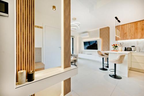 Kuchyň nebo kuchyňský kout v ubytování BlueApart Jeżynowa Jastarnia