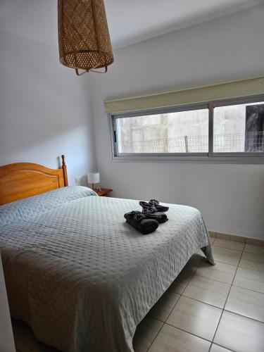 Postel nebo postele na pokoji v ubytování Jimaguas