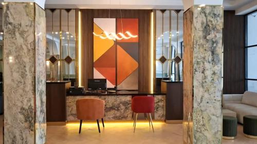 Et opholdsområde på Front One Hotel Mesir Surabaya