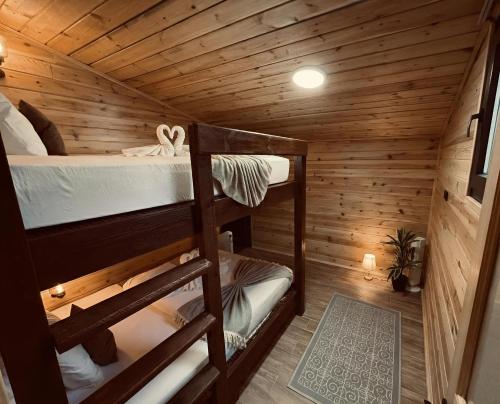 Postel nebo postele na pokoji v ubytování Ayder Luxury Resort - Villas & Bungalows