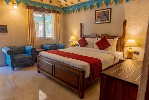 En eller flere senge i et værelse på Estherea Bagh Ranthambhore Tiger Territory