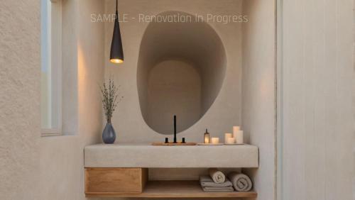 Et badeværelse på Apothikes Apartments