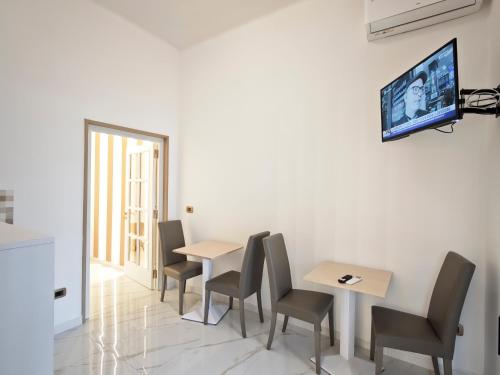 TV a/nebo společenská místnost v ubytování Nicolai Lounge Loft