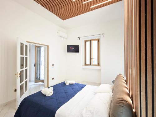 Postel nebo postele na pokoji v ubytování Nicolai Lounge Loft