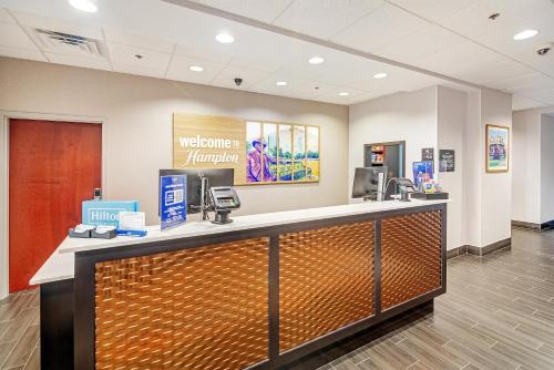 a waiting room at a welcome to hanford pharmacy at Hampton Inn Foley in Foley