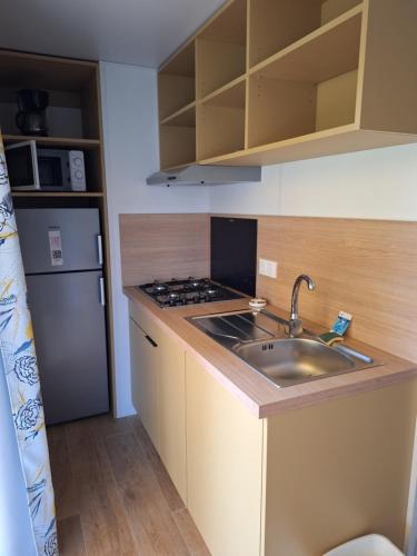 Køkken eller tekøkken på Oasis bora bora 4 personnes