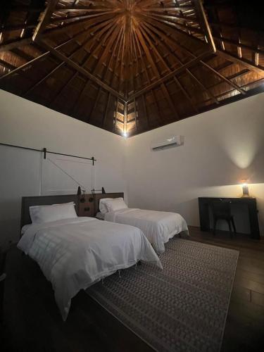 Posteľ alebo postele v izbe v ubytovaní QD Villa