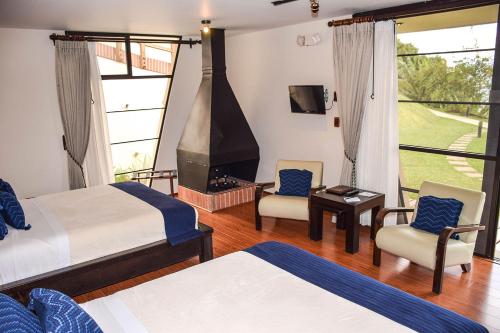 Katil atau katil-katil dalam bilik di San Gregorio Hotel & SPA